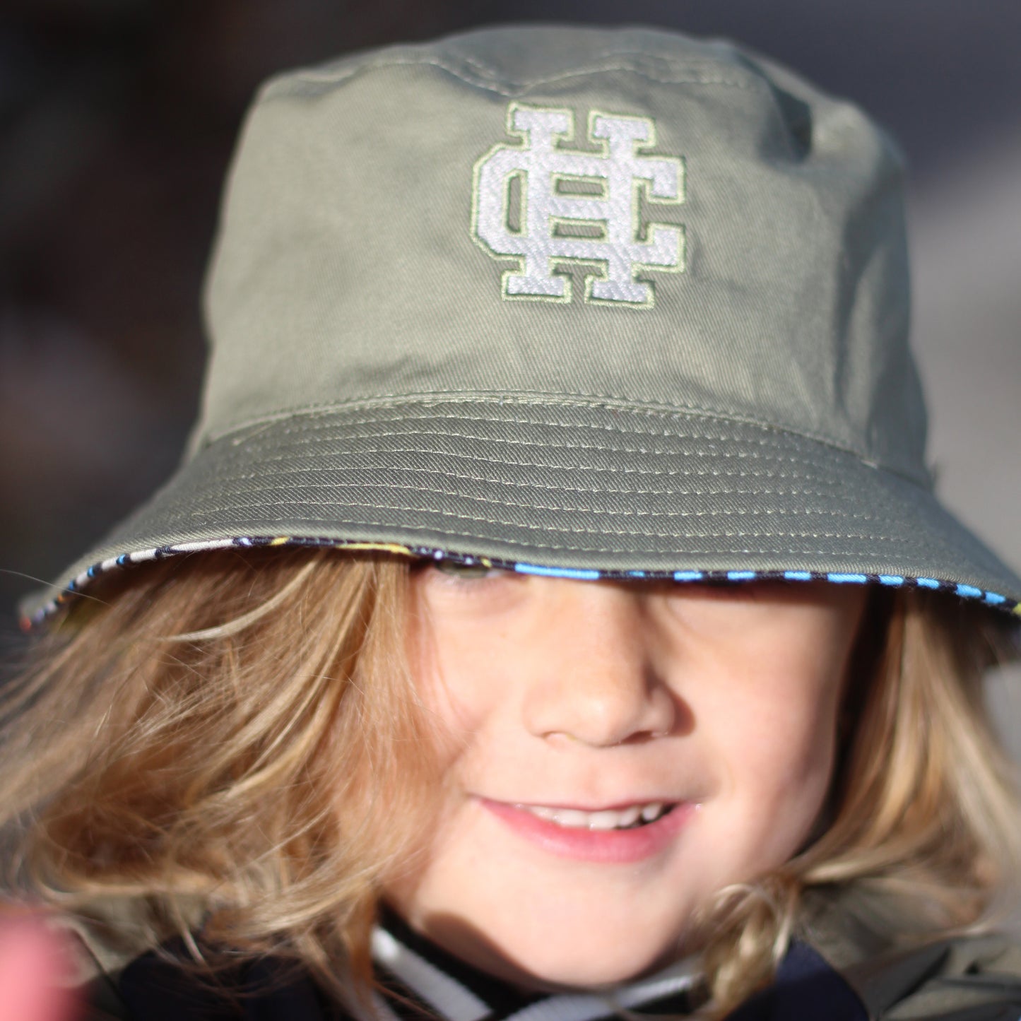 KIDS REVERSIBLE BUCKET HAT - 54cm (4 - 8yrs)
